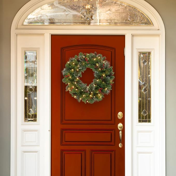 National Tree Company Pre-Lit Artificial Christmas Wreath, Green, Carolina Pine, White Lights, Decorated with Pine Cones and Glitter, Berry Clusters, Christmas Collection, 30 Inches